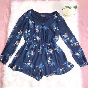 ASTR NAVY BLUE FLORAL-PRINT SURPLICE ROMPER